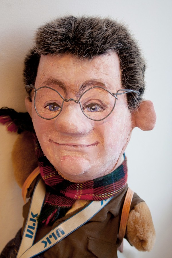 A male look-alike figure with glasses