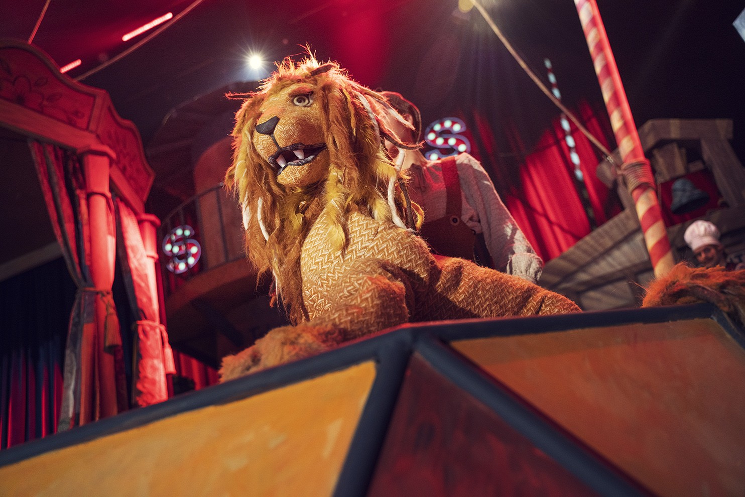 The lion puppet onstage.